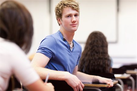 simsearch:400-05677768,k - Student sitting at a table in a classroom Stock Photo - Budget Royalty-Free & Subscription, Code: 400-05677777