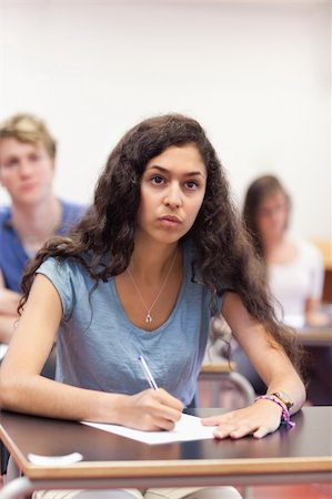 simsearch:400-05677768,k - Portrait of students taking notes in a classroom Stock Photo - Budget Royalty-Free & Subscription, Code: 400-05677772
