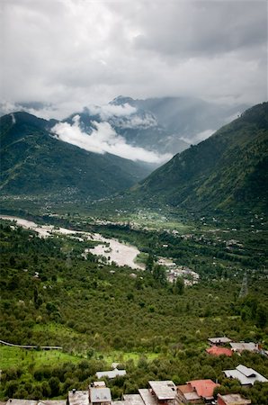 valley with river between high mountains in clouds, North India,  Himalayan Stock Photo - Budget Royalty-Free & Subscription, Code: 400-05679910