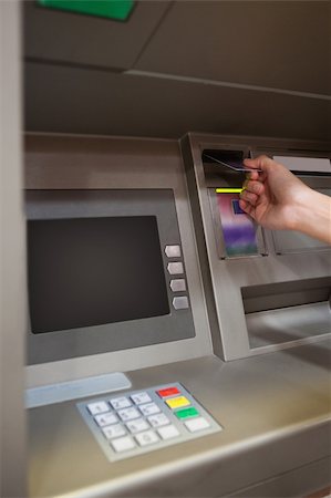 simsearch:400-05670020,k - Portrait of a hand inserting a credit card in an ATM Stock Photo - Budget Royalty-Free & Subscription, Code: 400-05670014