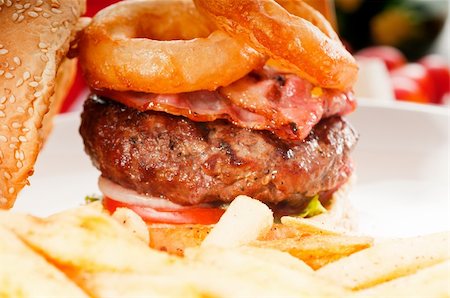 simsearch:400-06090558,k - classic american hamburger sandwich with onion rings and french fries, MORE DELICIOUS FOOD ON PORTFOLIO Stock Photo - Budget Royalty-Free & Subscription, Code: 400-05670307
