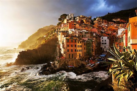 Sunset stormy light in Riomaggiore, Cinque Terre, Italy Stock Photo - Budget Royalty-Free & Subscription, Code: 400-05670623