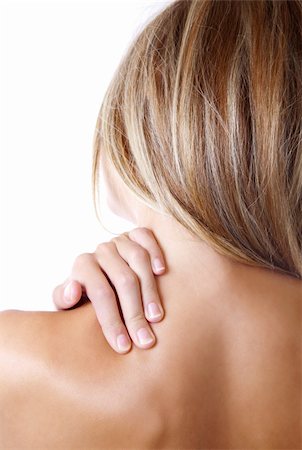 Woman holding her shoulder because of pain Stock Photo - Budget Royalty-Free & Subscription, Code: 400-05673846