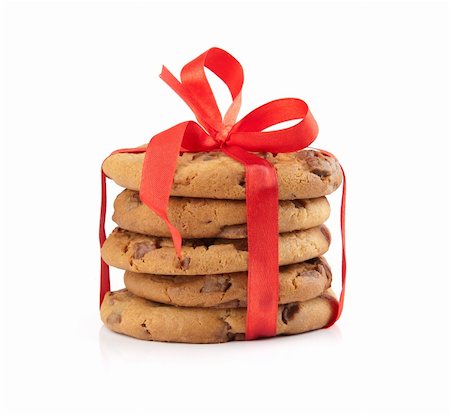 simsearch:614-06537664,k - stack of christmas chocolate cookies tied red ribbon isolated on white background Stock Photo - Budget Royalty-Free & Subscription, Code: 400-05684076