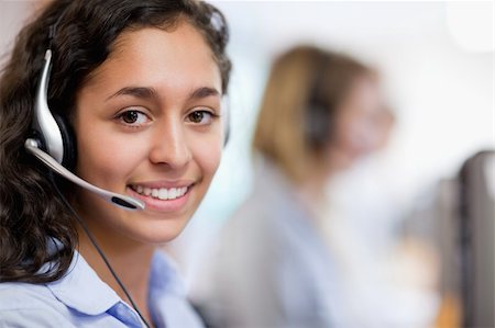 Close up of a customer assistant wearing a headset Stock Photo - Budget Royalty-Free & Subscription, Code: 400-05684305