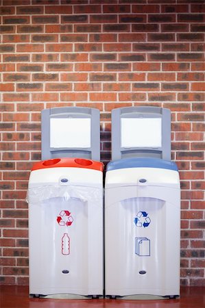 simsearch:400-07050071,k - Portrait of recycling bins against a wall Stock Photo - Budget Royalty-Free & Subscription, Code: 400-05684459