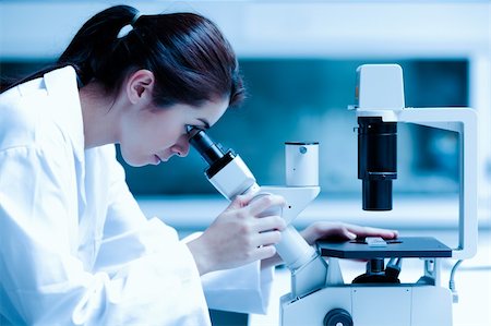 simsearch:400-05669968,k - Scientist using a microscope in a laboratory Stock Photo - Budget Royalty-Free & Subscription, Code: 400-05684507