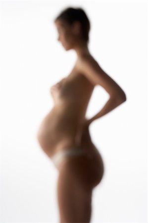pregnancy nude - Soft Focus View Of Pregnant Woman Stock Photo - Budget Royalty-Free & Subscription, Code: 400-05686504
