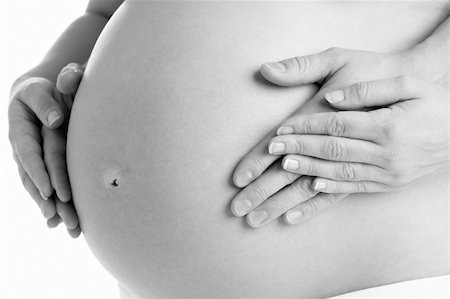 pregnancy nude - Couple Holding Pregnant Woman's Stomach Photographie de stock - Aubaine LD & Abonnement, Code: 400-05686509