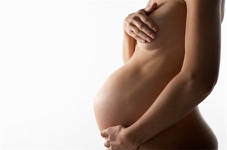 pregnancy nude - Detail Of Pregnant Woman Holding Stomach Stock Photo - Budget Royalty-Free & Subscription, Code: 400-05686503