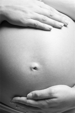 pregnancy nude - Detail Of Pregnant Woman Holding Stomach Stock Photo - Budget Royalty-Free & Subscription, Code: 400-05686522