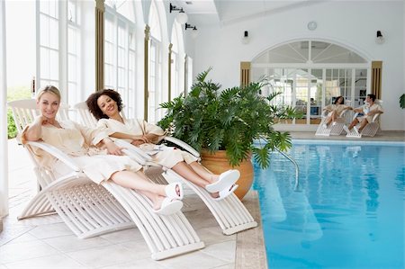 Women Relaxing Around Pool At Spa Stock Photo - Budget Royalty-Free & Subscription, Code: 400-05686703