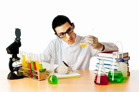 simsearch:400-05669968,k - Chemist in the lab experimenting with solutions Stock Photo - Budget Royalty-Free & Subscription, Code: 400-05687551