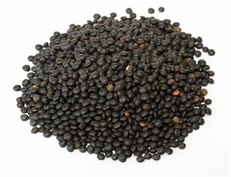 Heap of black lentil isolated on white Stock Photo - Budget Royalty-Free & Subscription, Code: 400-05680415