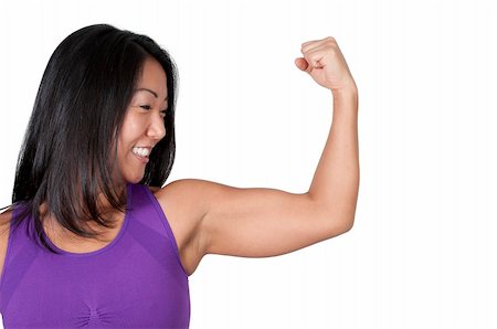 erotic female figures - A beautiful young Asian woman flexing her muscles during a workout Stock Photo - Budget Royalty-Free & Subscription, Code: 400-05694260