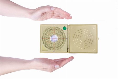 Hands with Compass feng shui Stock Photo - Budget Royalty-Free & Subscription, Code: 400-05695647