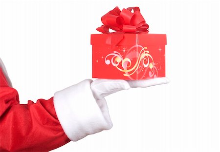 Santa Claus arm with a red christmas present Stock Photo - Budget Royalty-Free & Subscription, Code: 400-05695653