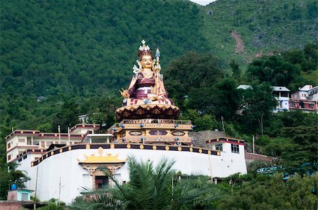 statues on building top - Rawalsar is a sacred place for Buddhists. 37.5 m statue of Padmasambhava, who is recognized as the second Buddha of this age, India Stock Photo - Budget Royalty-Free & Subscription, Code: 400-05695802