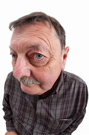 funny old people faces - Photo of a man in his sixties using a fisheye lens to exaggerate his features. Stock Photo - Budget Royalty-Free & Subscription, Code: 400-05696414