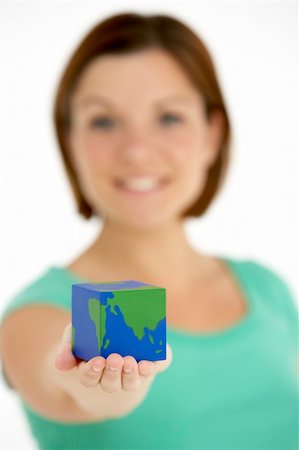 Woman Holding Cube Shaped Globe Stock Photo - Budget Royalty-Free & Subscription, Code: 400-05696602