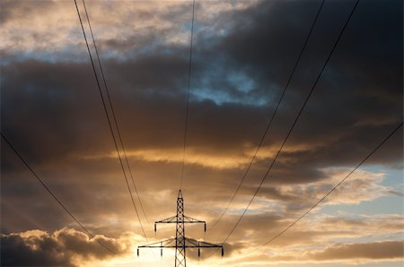 pollution sun - electricity pylons against a nice yellow orange sunset Stock Photo - Budget Royalty-Free & Subscription, Code: 400-05697053