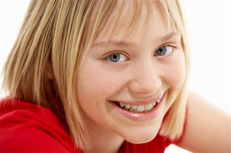 simsearch:400-05697219,k - Portrait Of Smiling Young Girl Stock Photo - Budget Royalty-Free & Subscription, Code: 400-05697078