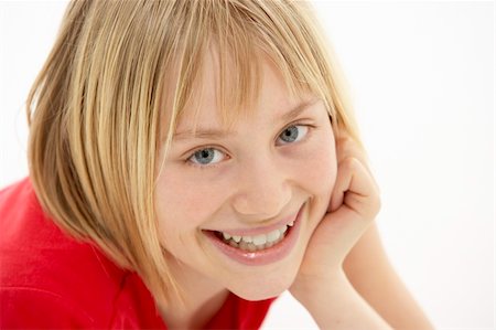 simsearch:400-05697219,k - Portrait Of Smiling Young Girl Stock Photo - Budget Royalty-Free & Subscription, Code: 400-05697084