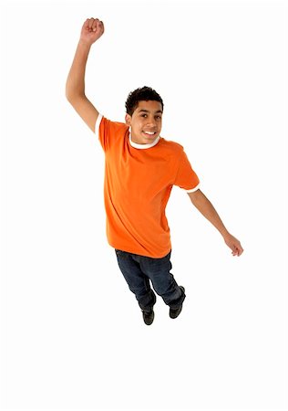 simsearch:400-05697219,k - Young Boy Leaping In Studio Stock Photo - Budget Royalty-Free & Subscription, Code: 400-05697135