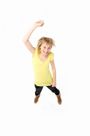 simsearch:400-05697219,k - Young Girl Leaping In Studio Stock Photo - Budget Royalty-Free & Subscription, Code: 400-05697136