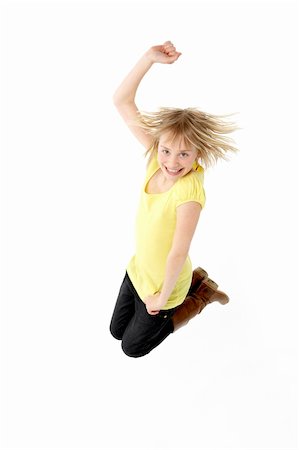 simsearch:400-05697219,k - Teenage Girl Leaping In Studio Stock Photo - Budget Royalty-Free & Subscription, Code: 400-05697137