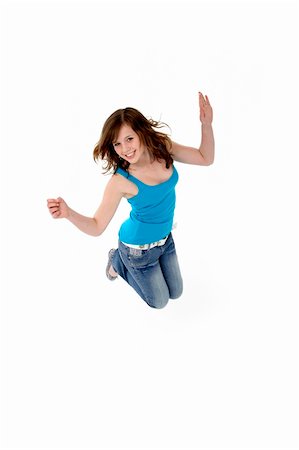 simsearch:400-05697219,k - Young Girl Leaping In Studio Stock Photo - Budget Royalty-Free & Subscription, Code: 400-05697141