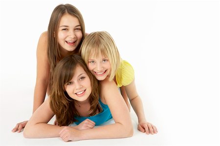 simsearch:400-05697219,k - Group Of Three Young Girls In Studio Stock Photo - Budget Royalty-Free & Subscription, Code: 400-05697155