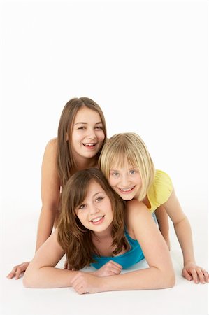 simsearch:400-05697219,k - Group Of Three Young Girls In Studio Stock Photo - Budget Royalty-Free & Subscription, Code: 400-05697153