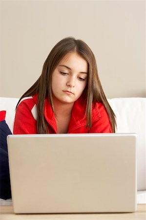 simsearch:400-05697169,k - Young Girl Using Laptop At Home Stock Photo - Budget Royalty-Free & Subscription, Code: 400-05697190