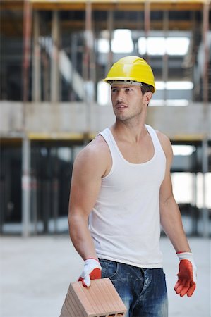 handsome hard worker people portrait at concstruction site Stock Photo - Budget Royalty-Free & Subscription, Code: 400-05698574