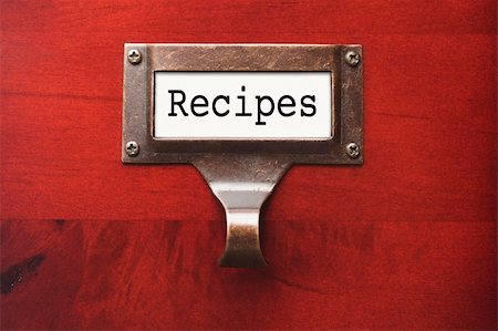 simsearch:400-06072564,k - Lustrous Wooden Cabinet with Recipes File Label in Dramatic LIght. Stock Photo - Budget Royalty-Free & Subscription, Code: 400-05699315