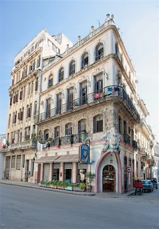 Typical old colonial house with vintage doors and windows in a corner in old Havana, Cuba Stock Photo - Budget Royalty-Free & Subscription, Code: 400-05699398