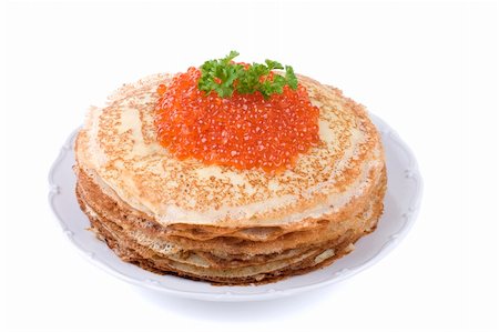 Pancake with red caviar on white background Stock Photo - Budget Royalty-Free & Subscription, Code: 400-05699458