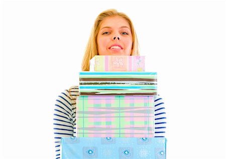 simsearch:400-05888428,k - Pretty teen girl holding stack of present boxes isolated on white Stock Photo - Budget Royalty-Free & Subscription, Code: 400-05692917