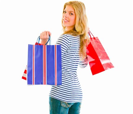 simsearch:400-05888428,k - Smiling teen girl with shopping bags isolated on white Stock Photo - Budget Royalty-Free & Subscription, Code: 400-05692921