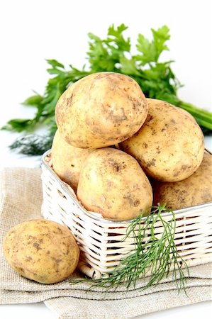 raw potato sack - Basket of fresh organic potatoes Stock Photo - Budget Royalty-Free & Subscription, Code: 400-05693790