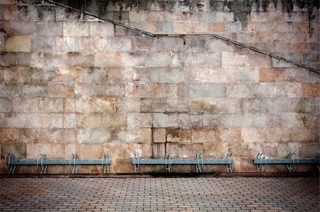 Aged wall with bike stands Stock Photo - Budget Royalty-Free & Subscription, Code: 400-05705860
