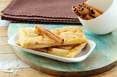 simsearch:400-04370315,k - Homemade apple pie and cinnamon stick Stock Photo - Budget Royalty-Free & Subscription, Code: 400-05706401