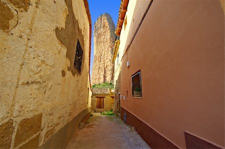 simsearch:400-06530910,k - Narrow Street of a Medieval Spanish town, Overlooking the Rocky Foothills of the Pyrenees Stock Photo - Budget Royalty-Free & Subscription, Code: 400-05709470