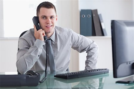 simsearch:400-05710264,k - Businessman listening carefully to caller on the phone Stock Photo - Budget Royalty-Free & Subscription, Code: 400-05709696