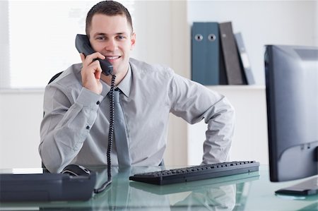 simsearch:400-05710264,k - Businessman getting good news on the phone Stock Photo - Budget Royalty-Free & Subscription, Code: 400-05709693