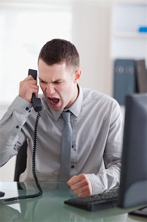 simsearch:400-05710264,k - Angry young businessman on the phone Stock Photo - Budget Royalty-Free & Subscription, Code: 400-05709714