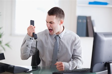 simsearch:400-05710264,k - Angry businessman shouting at the phone Stock Photo - Budget Royalty-Free & Subscription, Code: 400-05709713