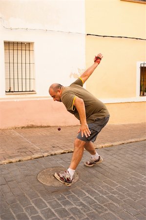 simsearch:400-05730554,k - Traditional Spanish pelota player performing a serve Stock Photo - Budget Royalty-Free & Subscription, Code: 400-05701357