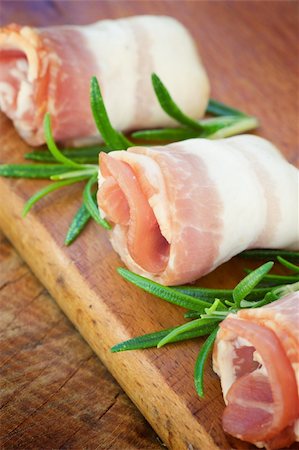 simsearch:400-06207145,k - Slices of rolled bacon with rosemary Stock Photo - Budget Royalty-Free & Subscription, Code: 400-05701406